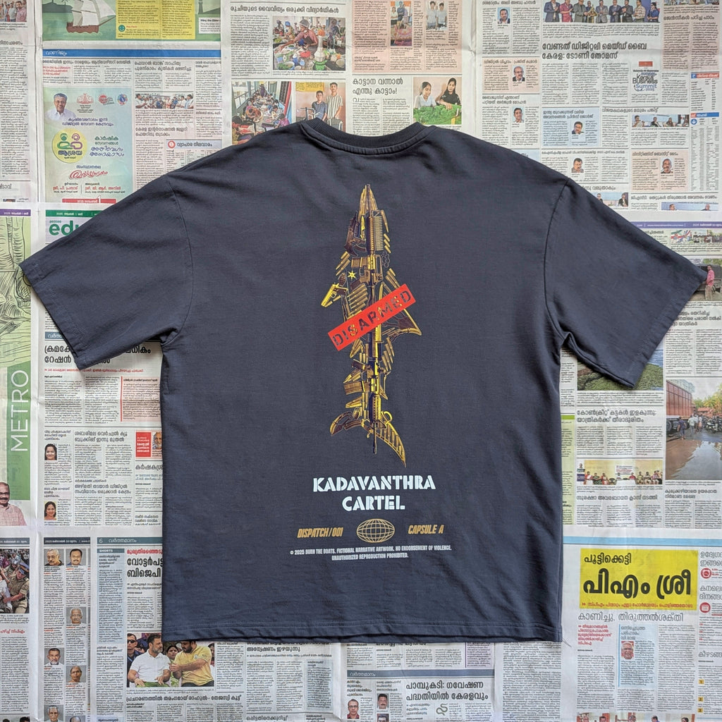 Grey t-shirt with full sized shark shaped weapons imagery