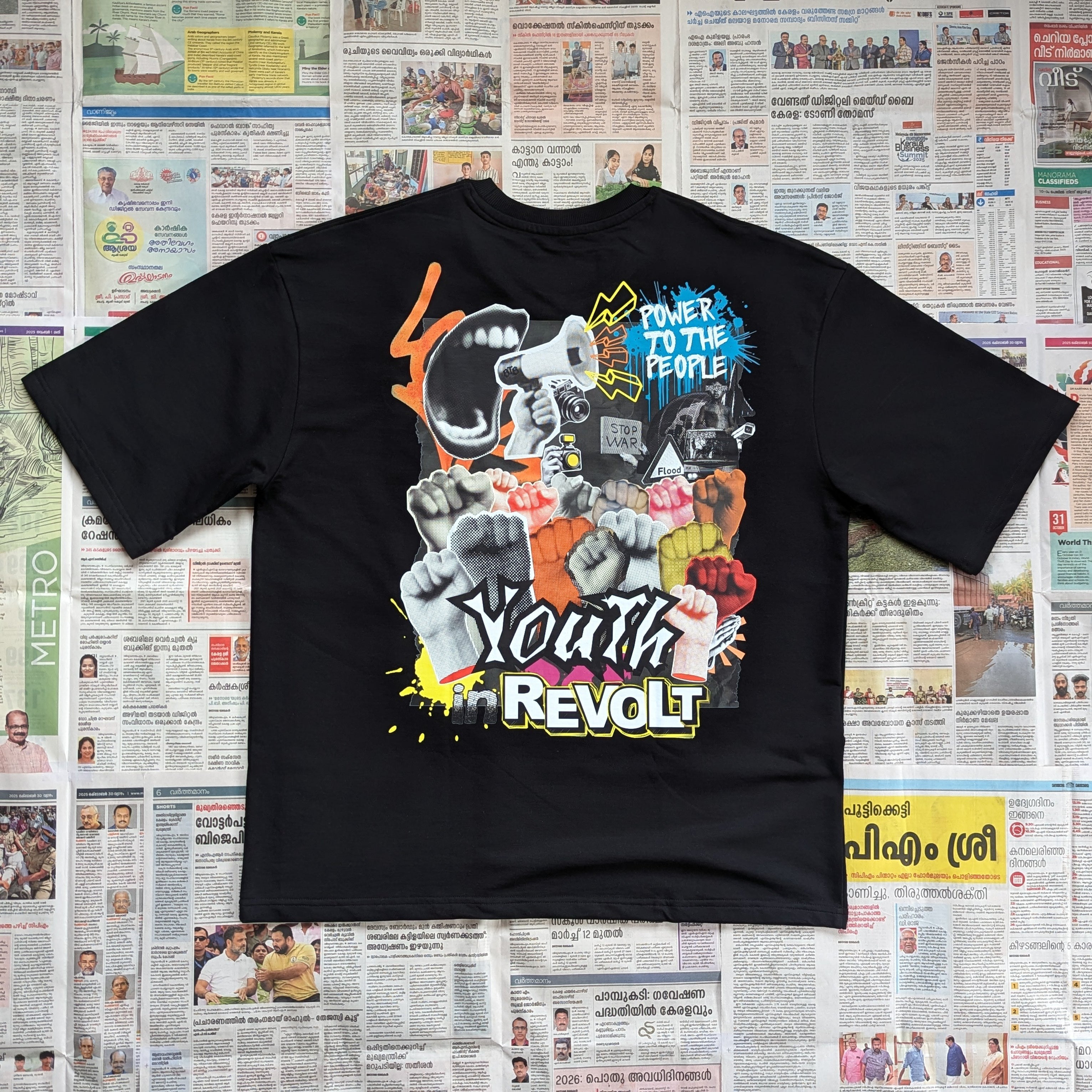 Black oversized tshirt with punk protest inspired graphics